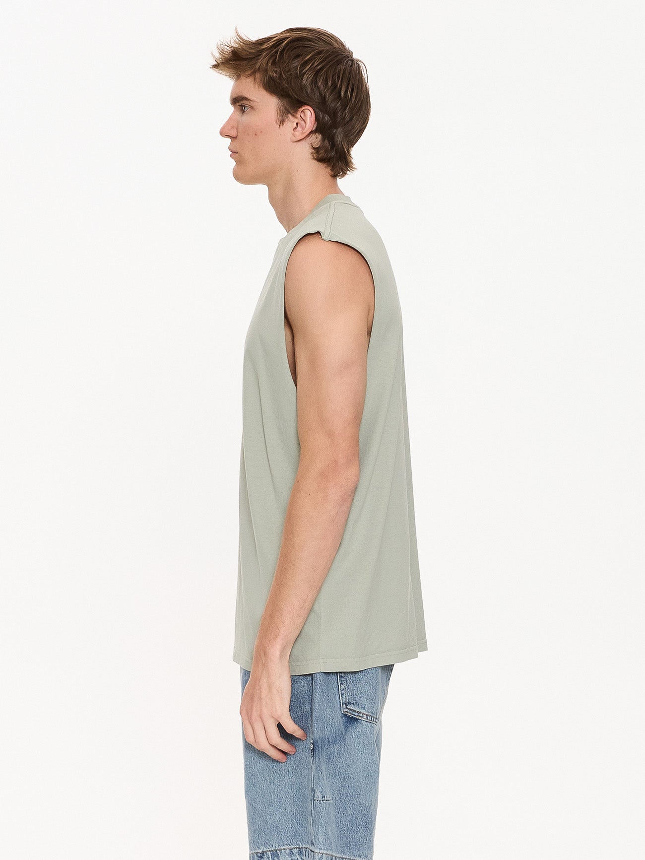 Thrills Co A Haven For The Restless Merch Fit Muscle Tee - Dirty Sage in Dirty Sage