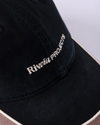 Rivvia Projects Passage Cap in BLACK BROWN