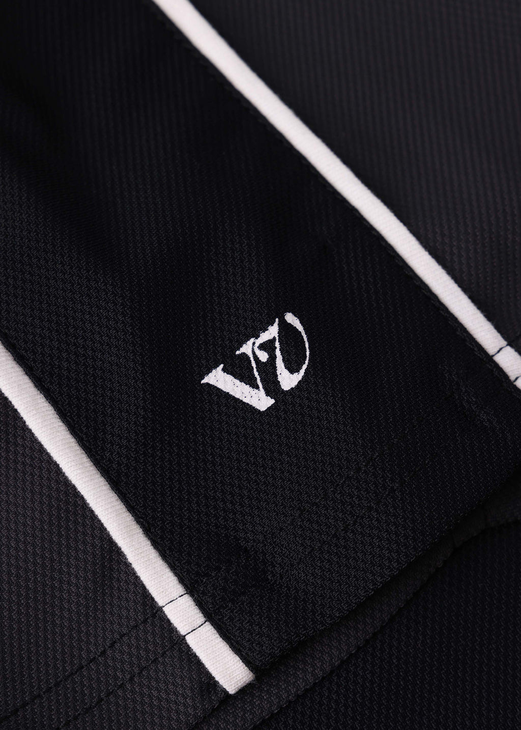Rivvia Projects Passage Polo in BLACK CHARCOAL