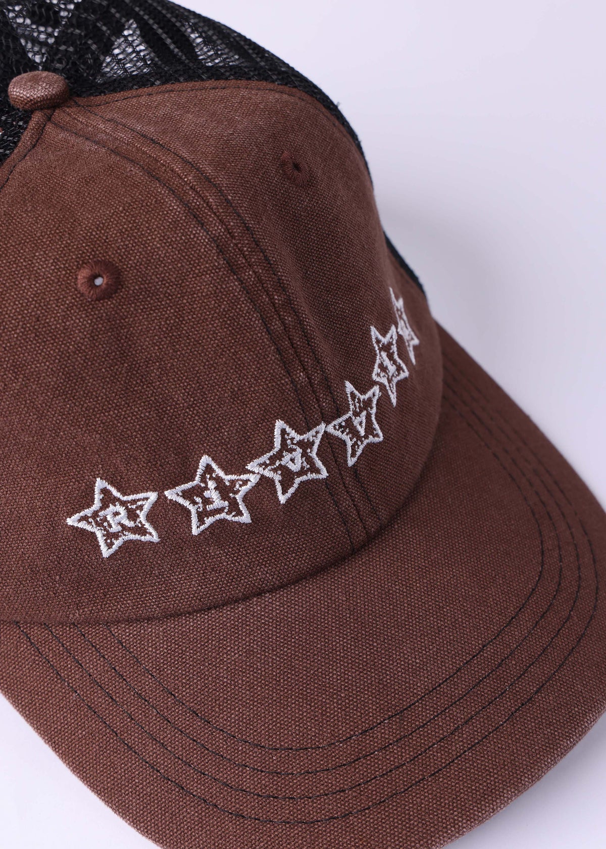 Rivvia Projects Stars Trucker Cap in BROWN BLUE
