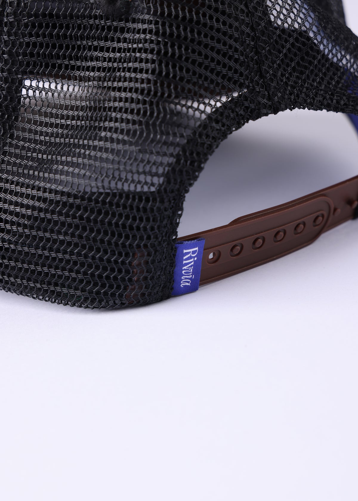 Rivvia Projects Stars Trucker Cap in BROWN BLUE